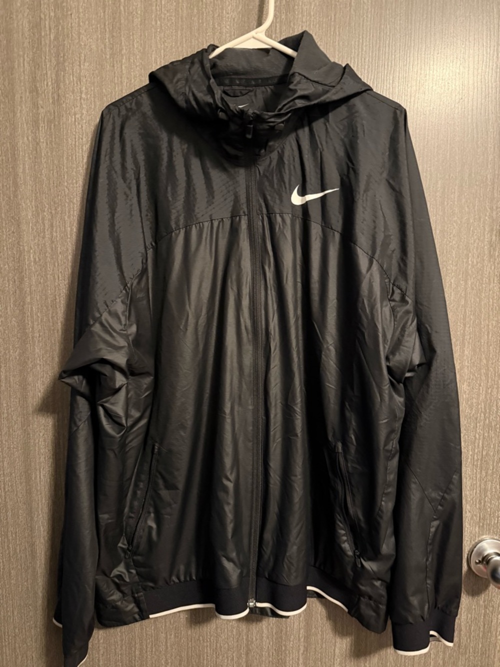 Nike Black Hooded Lightweight Jacket with White Swoosh